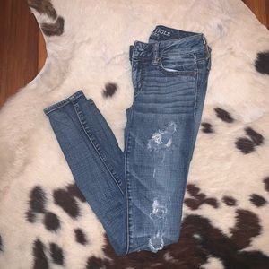 ae distressed skinny jeans